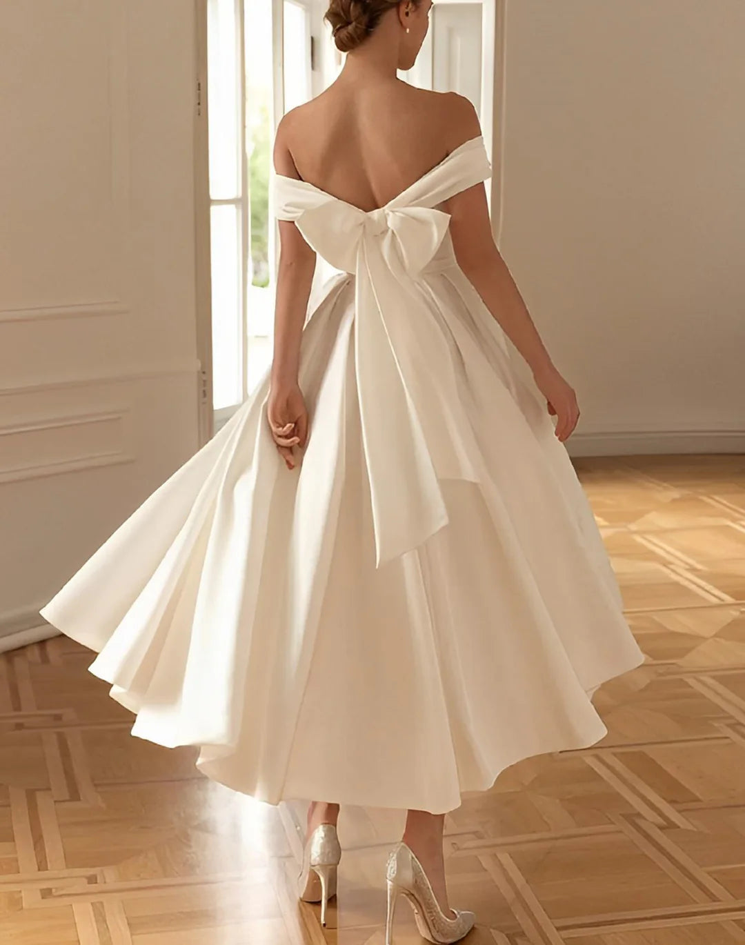 Full view of an elegant A-line V-neck floor-length wedding dress.