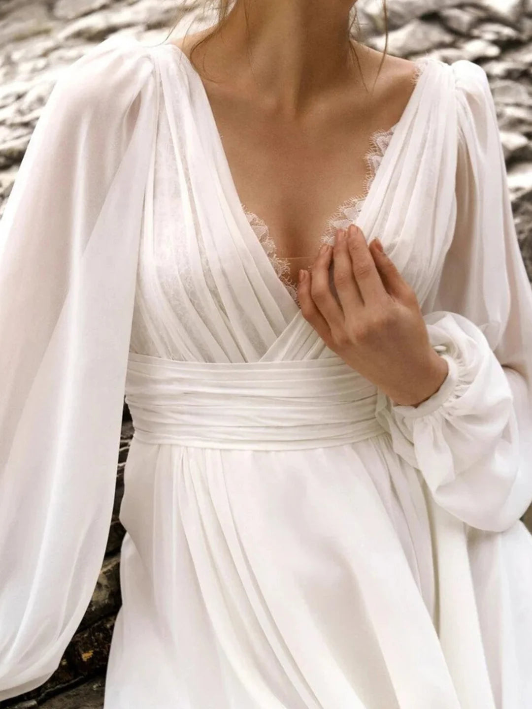 Detail of the V-neckline on the A-Line wedding dress.