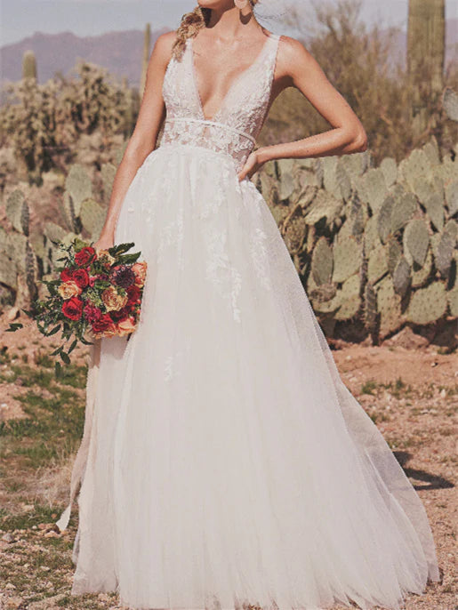 Elegant A-Line V-Neck wedding dress with a sweep train.