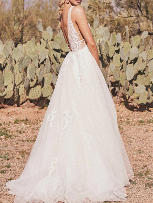 Side profile of A-Line wedding gown showcasing the sweep train.