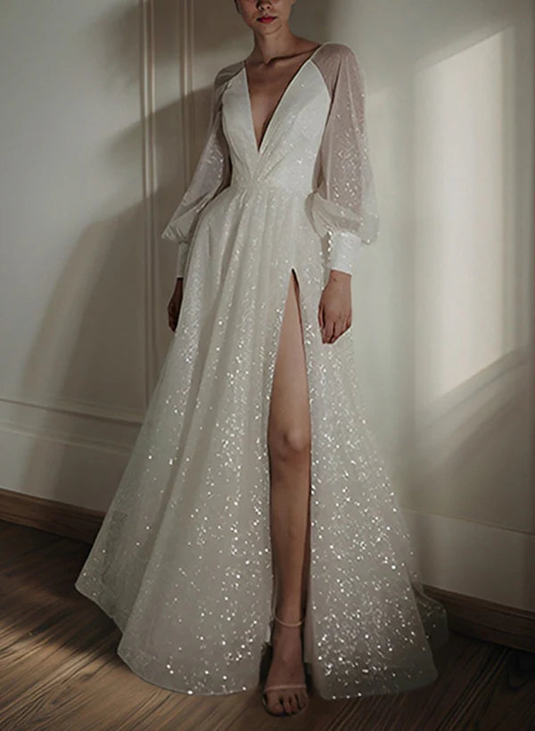 Full length view of a bride wearing an A-line V-neck wedding dress.