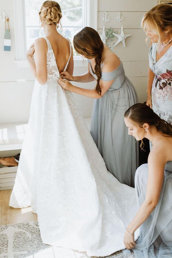 Full view of A-line wedding dress featuring a graceful court train.