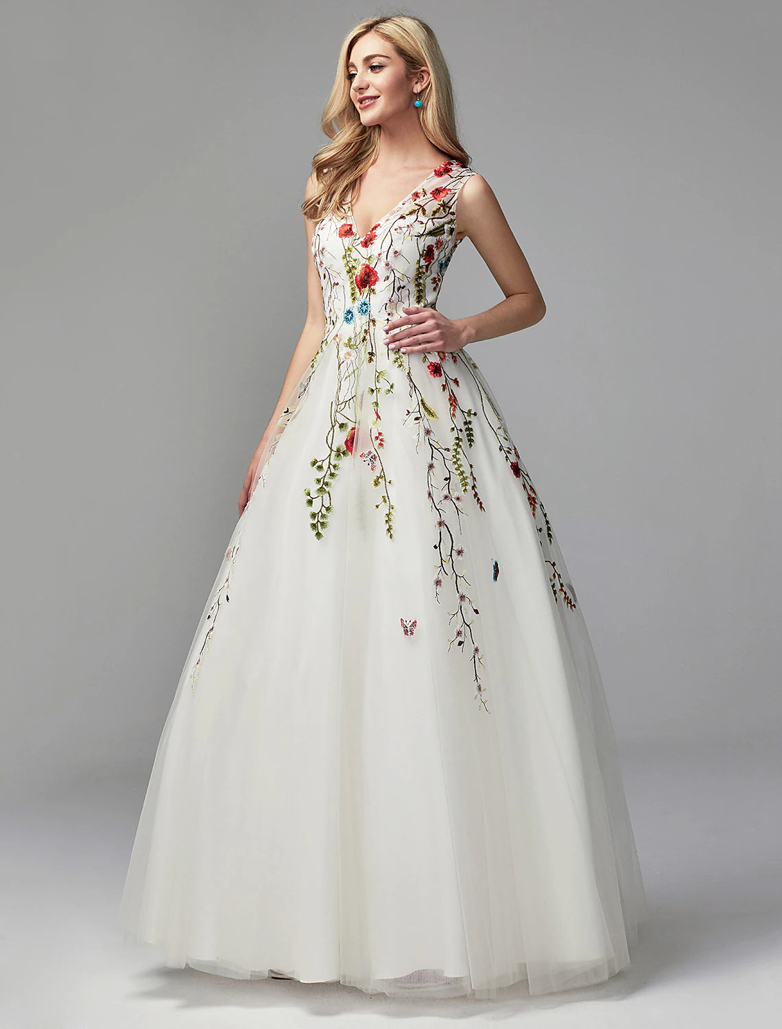 Side view of sleeveless floral lace special occasion gown.