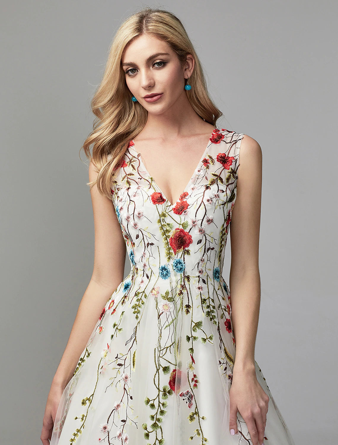 Detail of delicate lace appliques on the A-Line dress skirt.