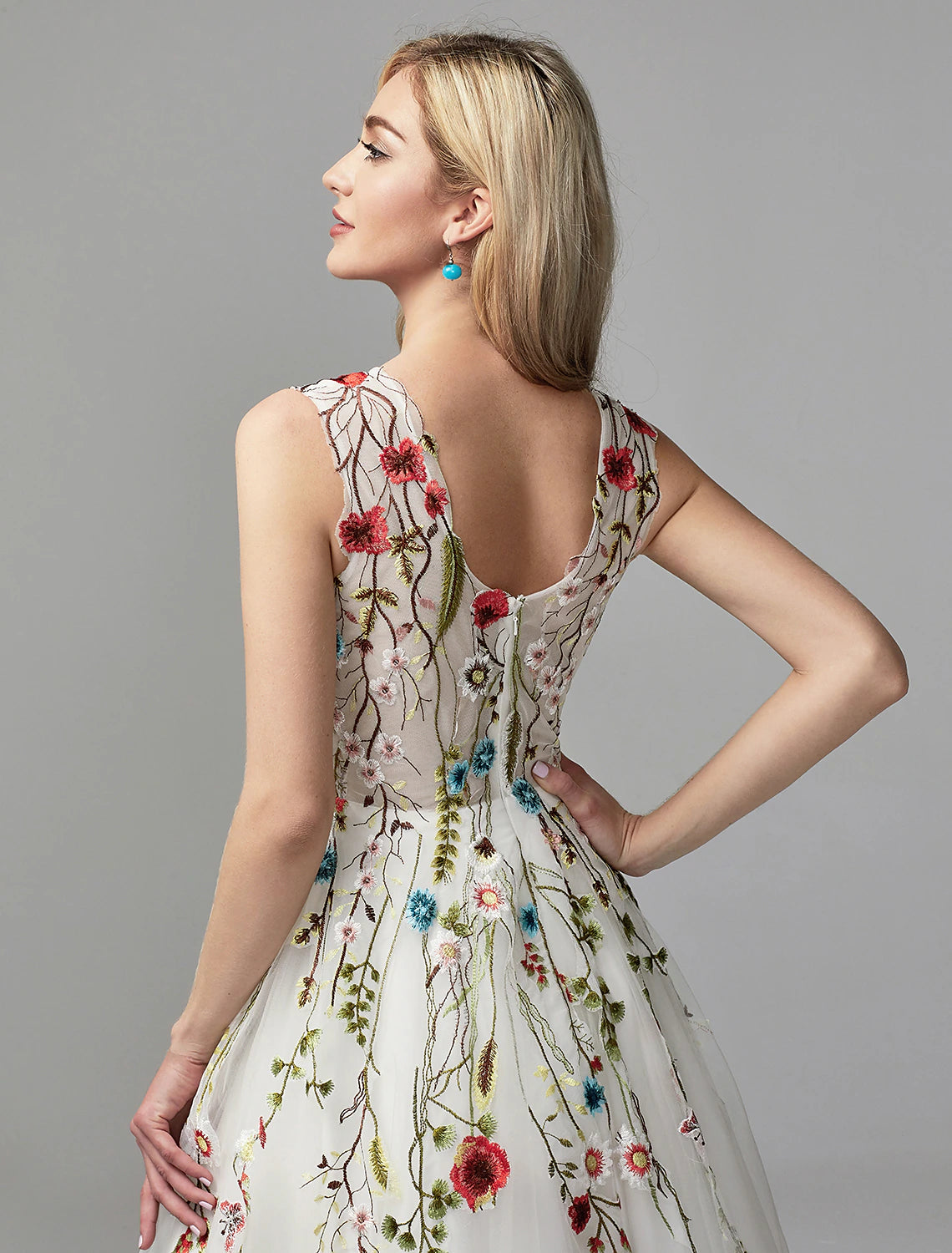Full length view of the elegant floral lace dress for formal events.