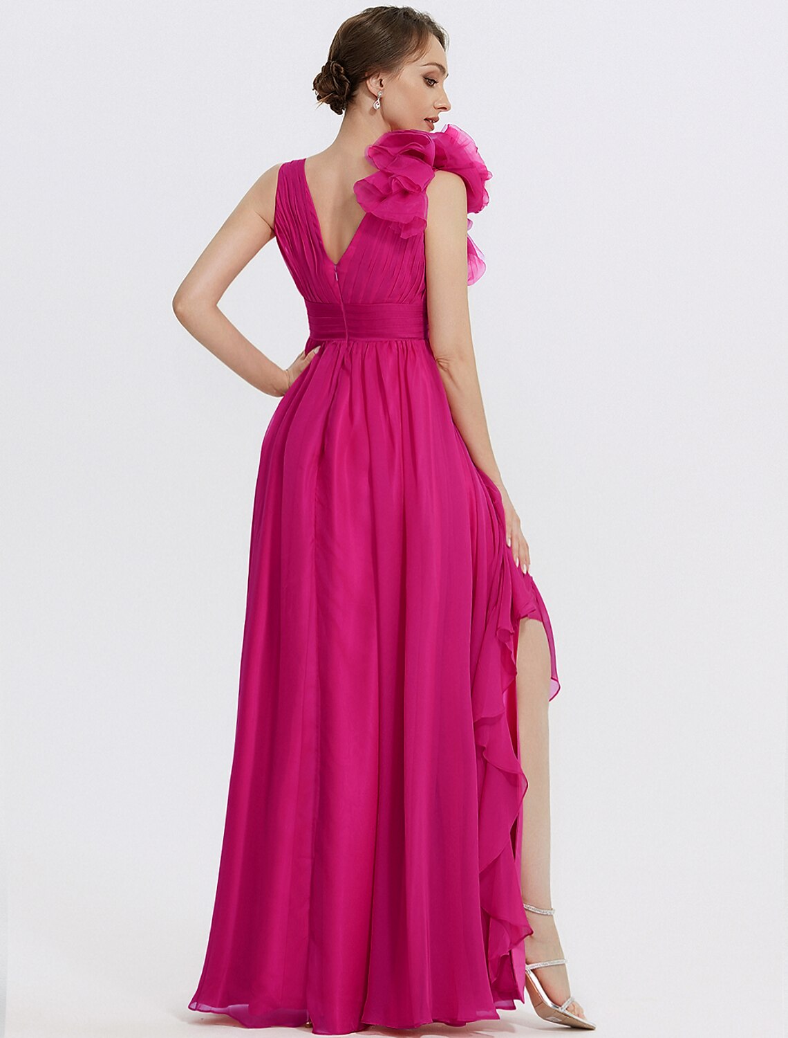 Back view of a floor-length chiffon formal dress.