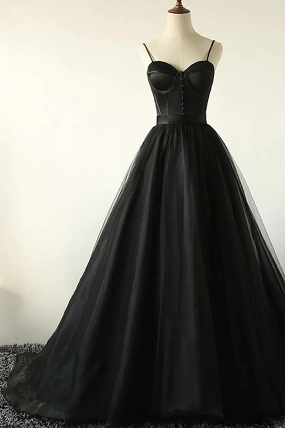 Elegant black A-line tulle long prom dress, front view.