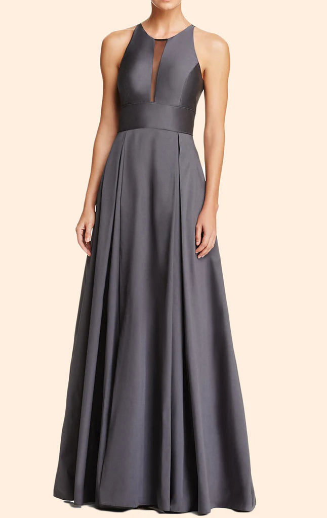 Woman wearing an elegant navy A-line V-neck formal gown.