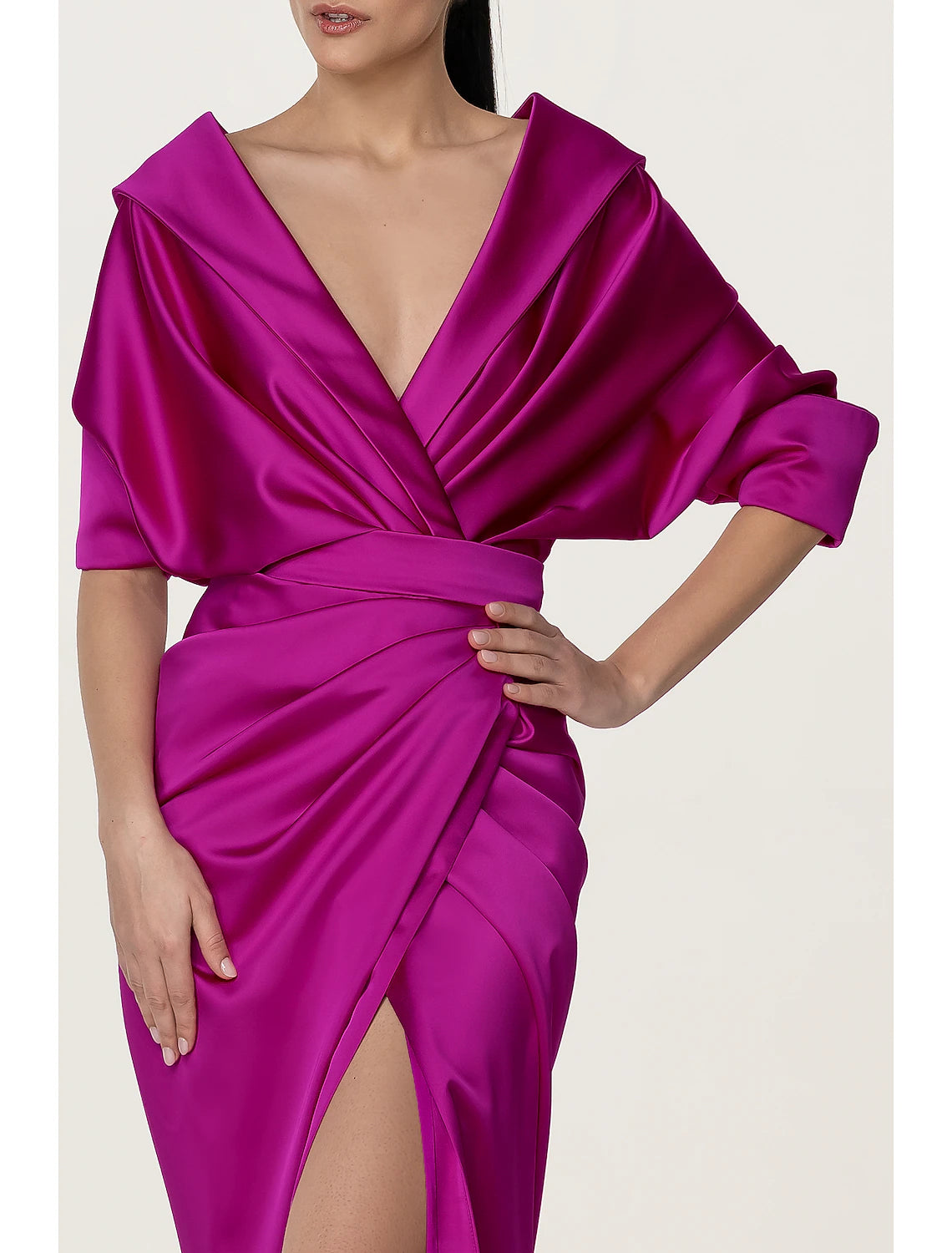 Back view of black satin A-line gown showing sweep train.