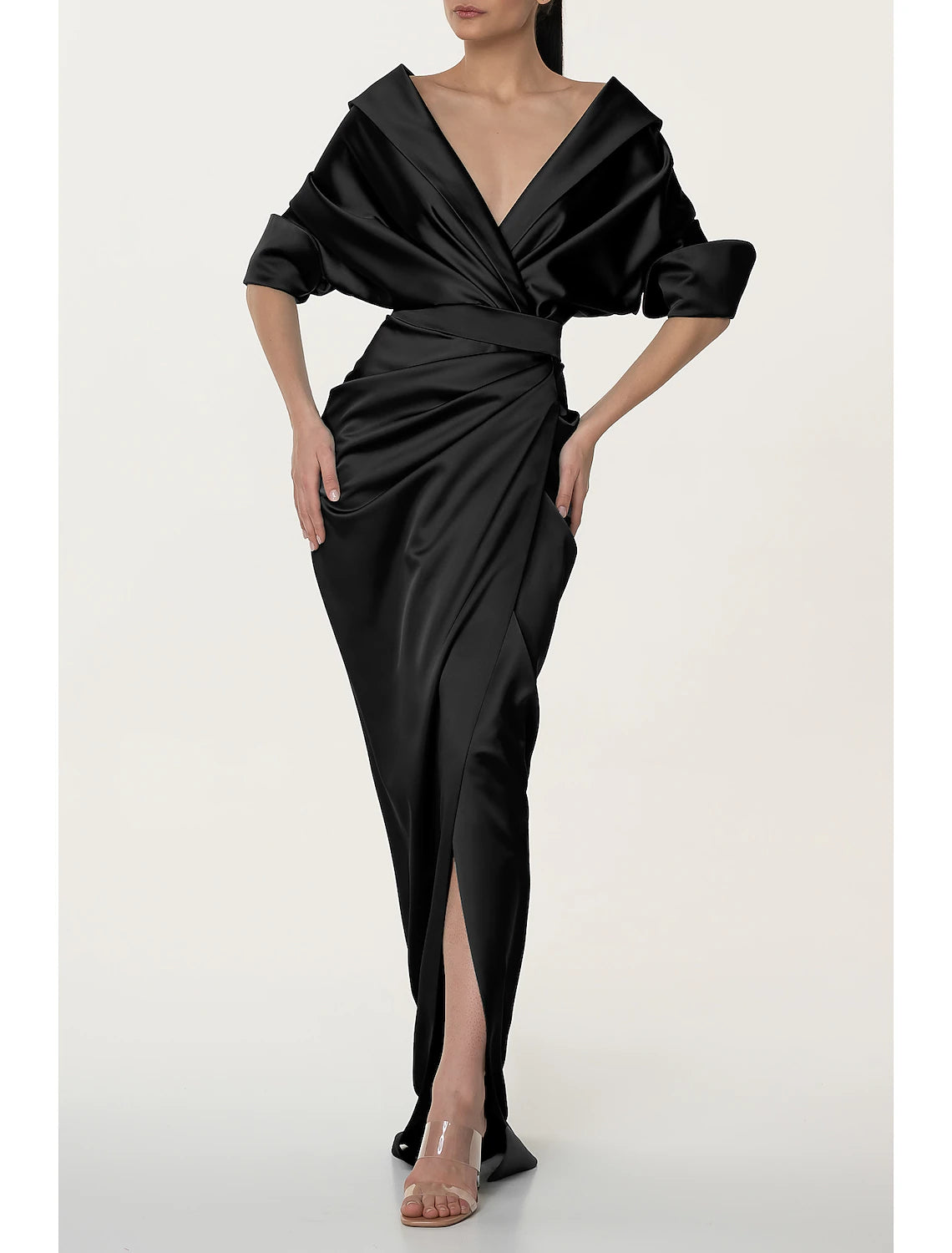 Model posing in black V-neck half sleeve satin formal dress.