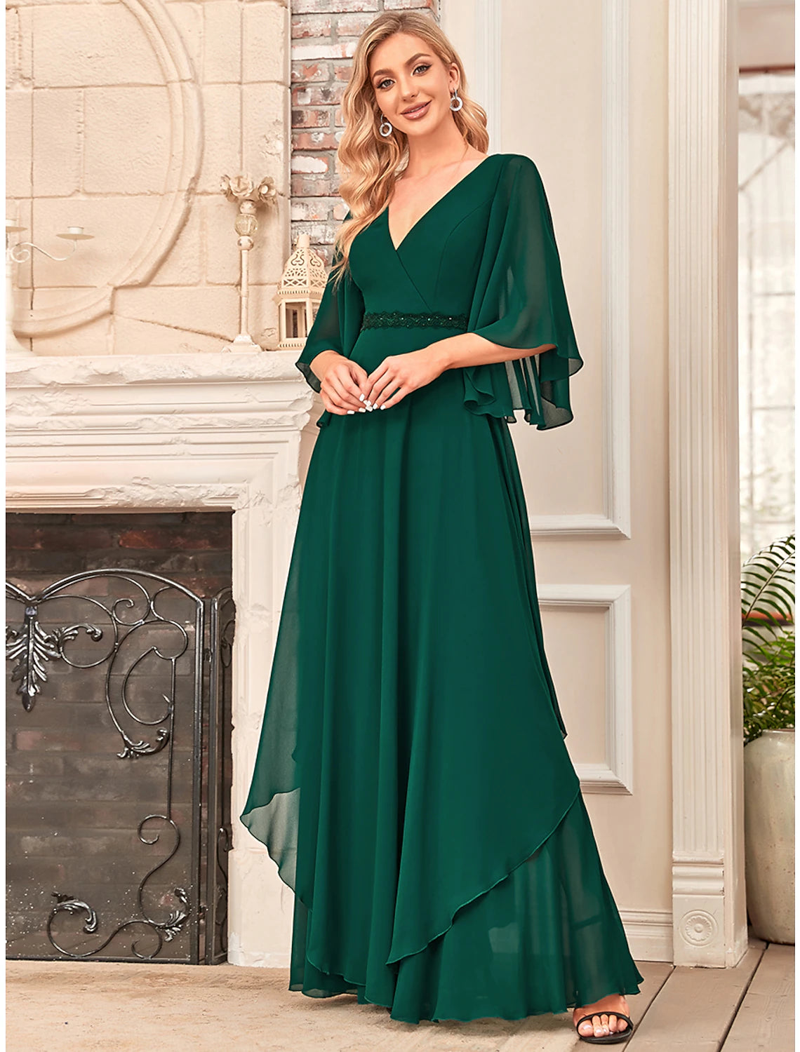 Elegant A-Line Mother of the Bride dress with V-neck and half sleeves.
