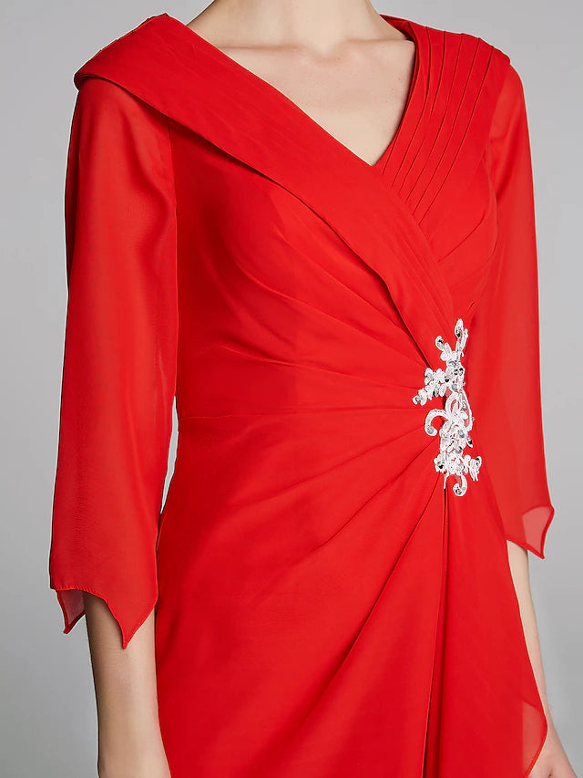 Close-up of the V-neckline and half sleeves on the elegant gown.