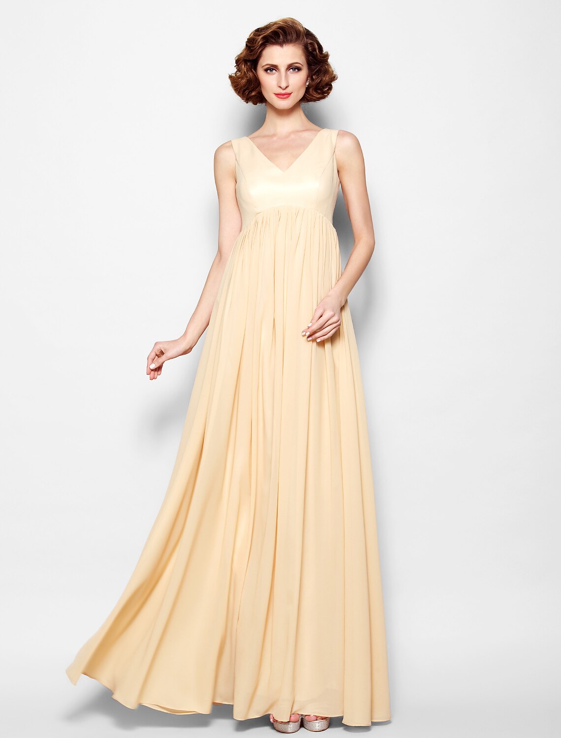 Side view of the chiffon lace floor-length mother of the bride gown.