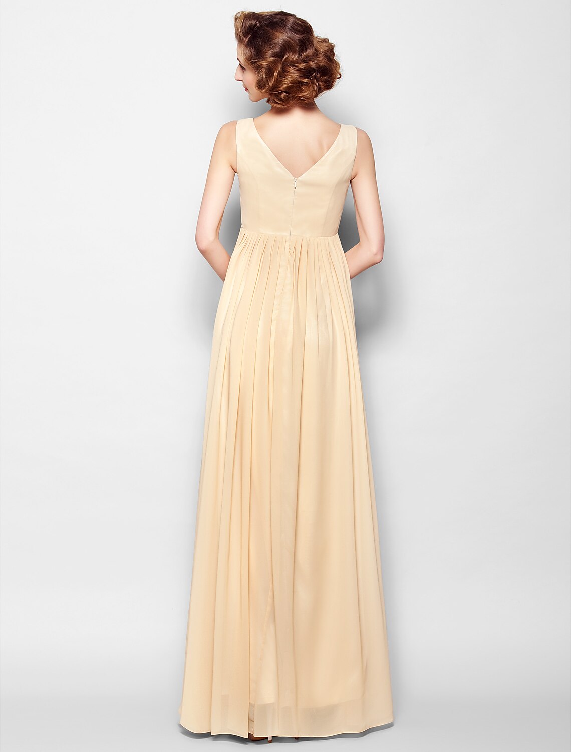 Back view of the formal A-line dress with delicate lace details.