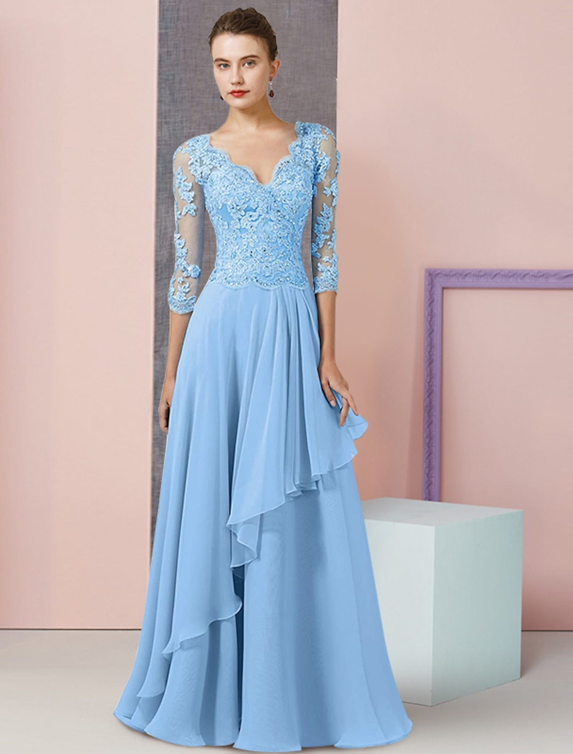 Formal A-Line gown featuring chiffon, beading, and sequin appliques.