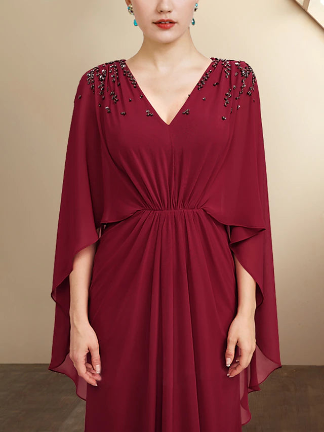 Side view of the A-Line chiffon dress with pleats and half sleeves.