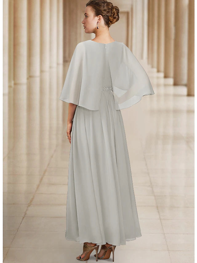 Chiffon A-line dress featuring pleats and a sash detail.