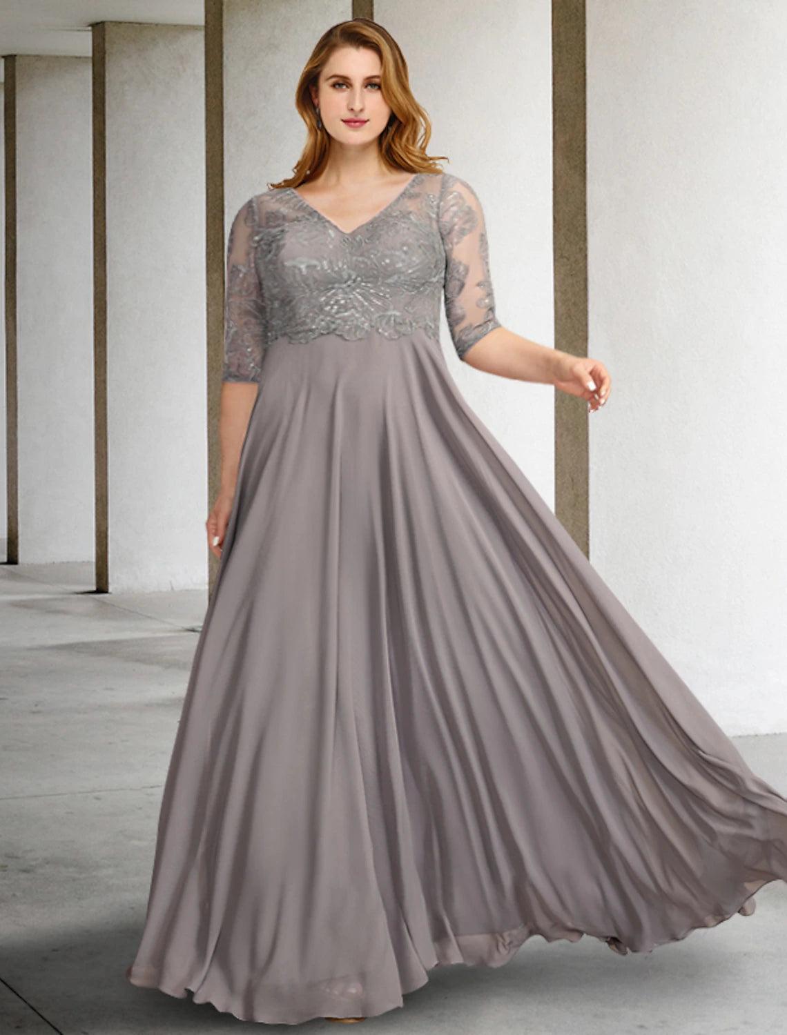 Elegant A-line Mother of the Bride dress with V-neck and half sleeves.