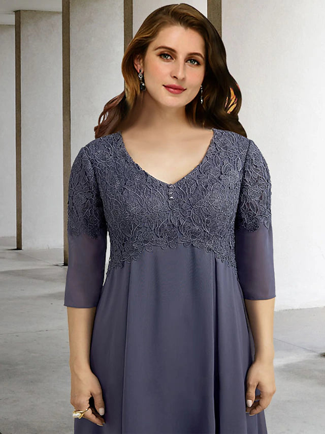 Back view of the tea length chiffon dress with button details.