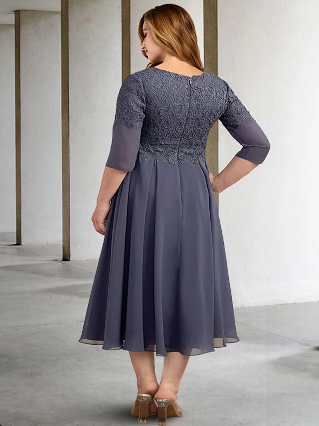 Close-up of appliques and buttons on the half sleeve V-neck dress.