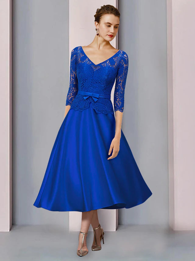 Elegant A-Line V-Neck half sleeve dress with satin and lace details.