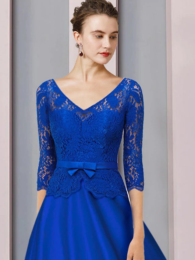 Formal tea length dress featuring a V-neck and half sleeves, suitable for weddings.