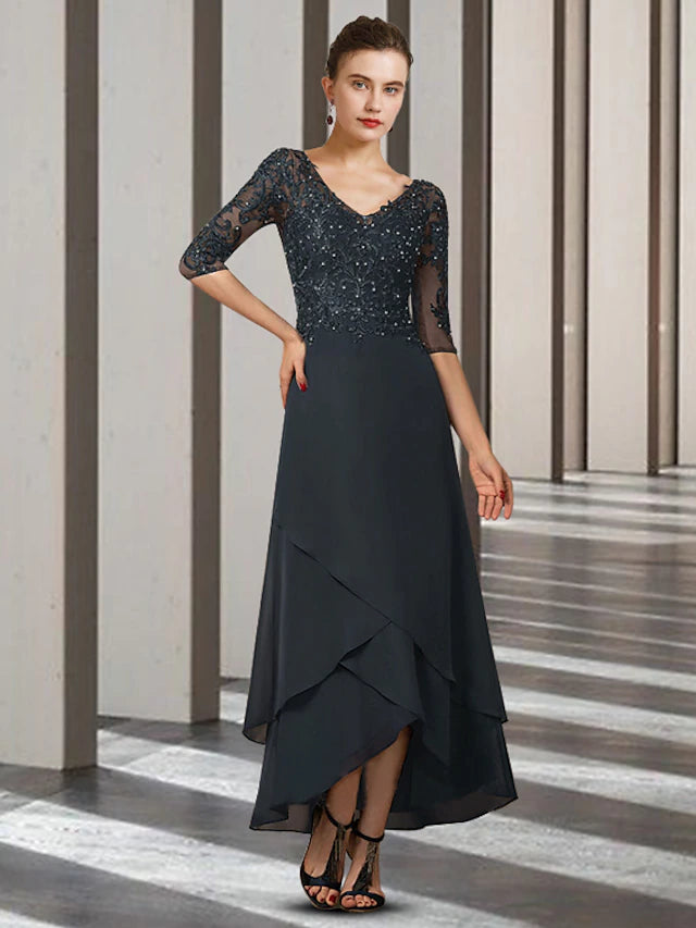 Elegant A-Line Mother of the Bride dress with V-neck, half sleeves, and high-low hem in chiffon and lace.