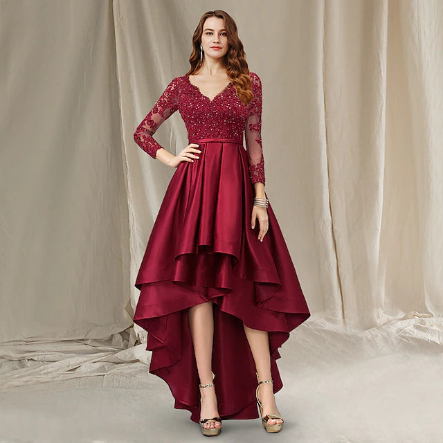Elegant A-line Mother of the Bride gown with V-neck, half sleeves, and high-low hem, adorned with lace and beading.