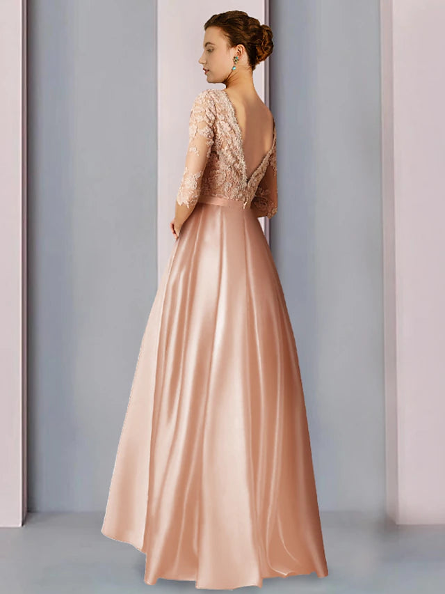Side view of an A-line tea-length dress, showing the asymmetrical high-low hem and half sleeves.