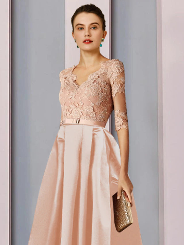 Back view of an elegant A-line dress with V-neck, half sleeves, and bow detail.