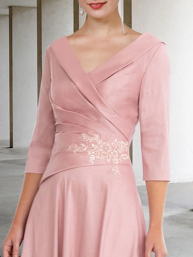 Back view of the elegant A-Line V-Neck Half Sleeve Lace Tea Length Mother of the Bride Dress.