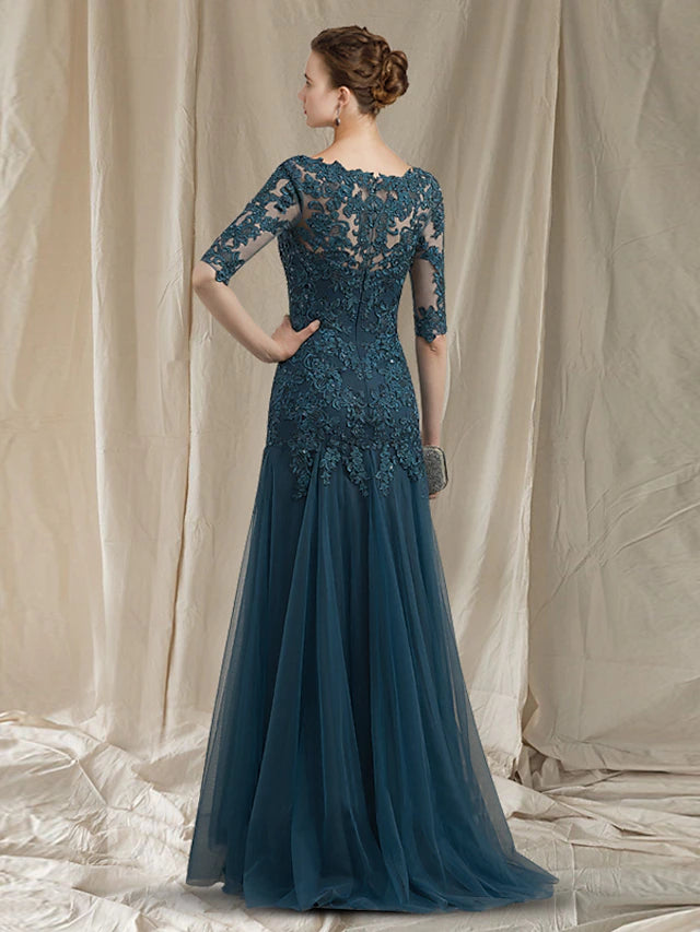 Close-up of lace and applique details on the Mother of the Bride dress.