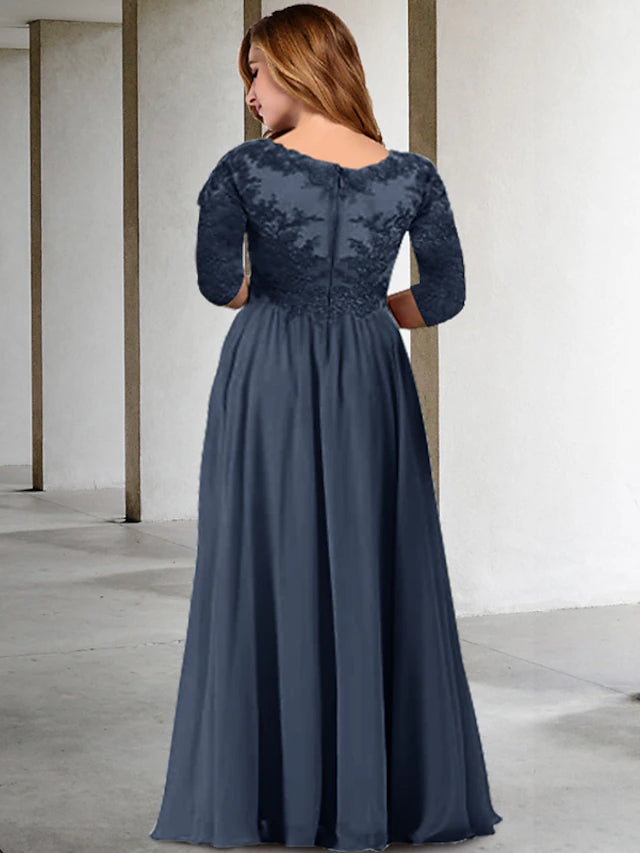 Close-up of the V-neckline and delicate appliques on the half-sleeve dress.