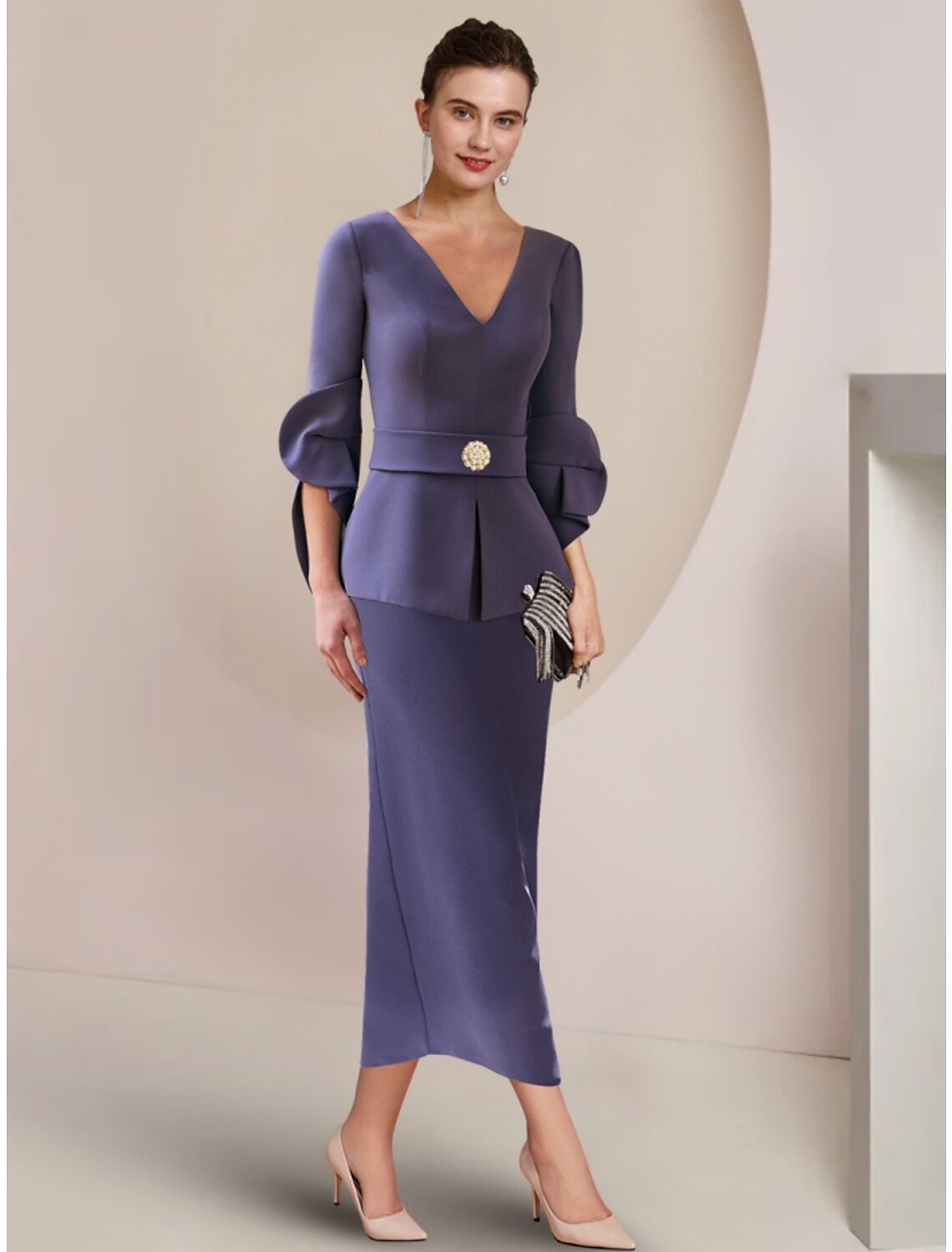Elegant A-Line Mother of the Bride dress with V-neck, half sleeves, and crystal brooch.