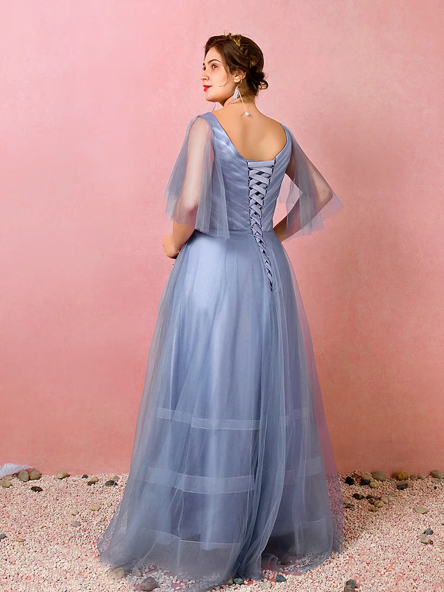 Side view of the floor-length satin prom gown with Chinese style details.