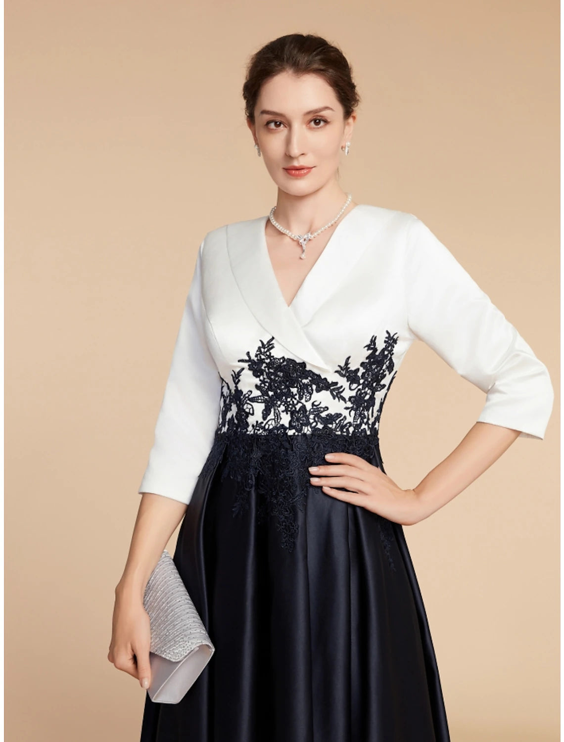 Back view of elegant V-neck half sleeve dress.