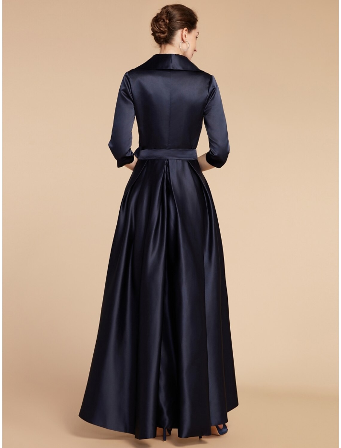 Side view of the A-line satin dress, highlighting half sleeves and ankle length.