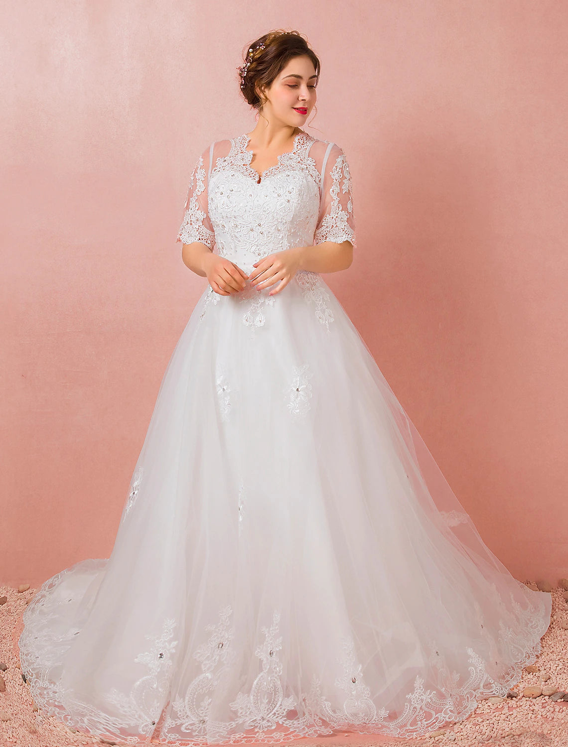 Elegant A-line satin wedding dress with V-neck, half sleeves, lace, and crystals.