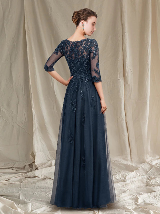 Side view of the A-line Mother of the Bride dress, showcasing floor-length design and delicate appliques.