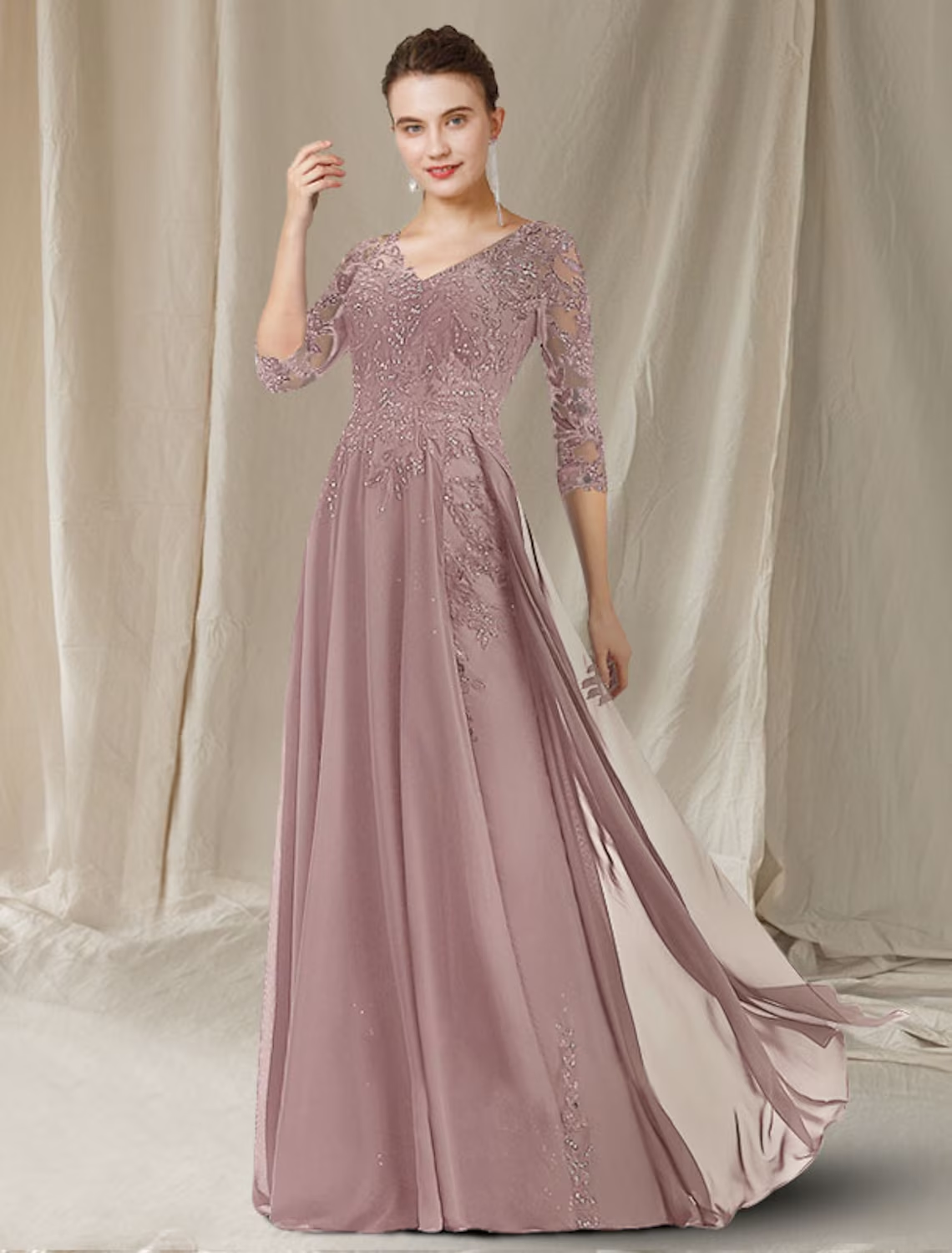 Side view of the A-line mother of the bride dress, showcasing the flowing chiffon skirt and half sleeves.