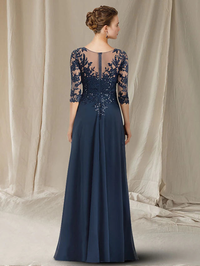 Close-up of the intricate sequin and lace appliques on the half sleeve and bodice of the dress.