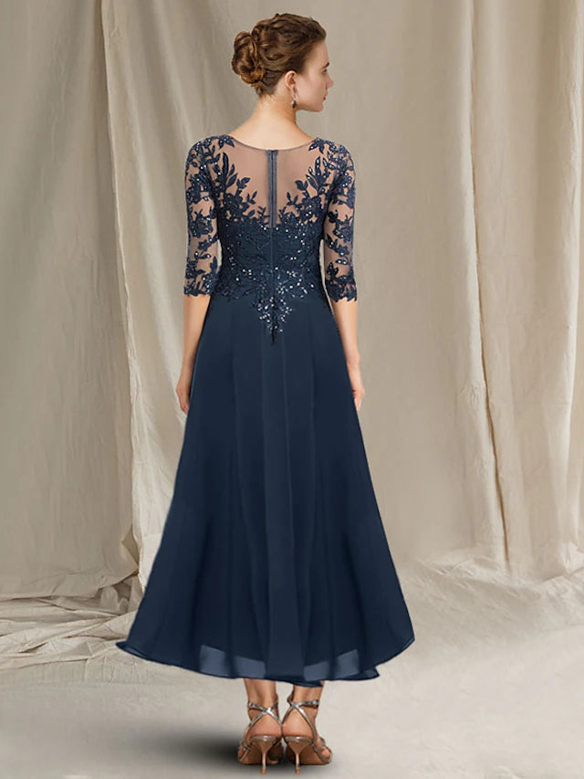 Full length view of the elegant tea length Mother of the Bride gown.