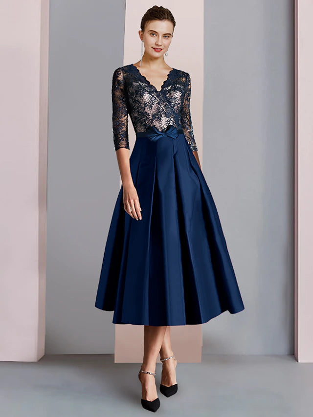 Elegant A-line Mother of the Bride dress with V-neck and half sleeves.