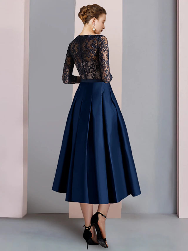 Back view of the formal Mother of the Bride gown with bow accent.