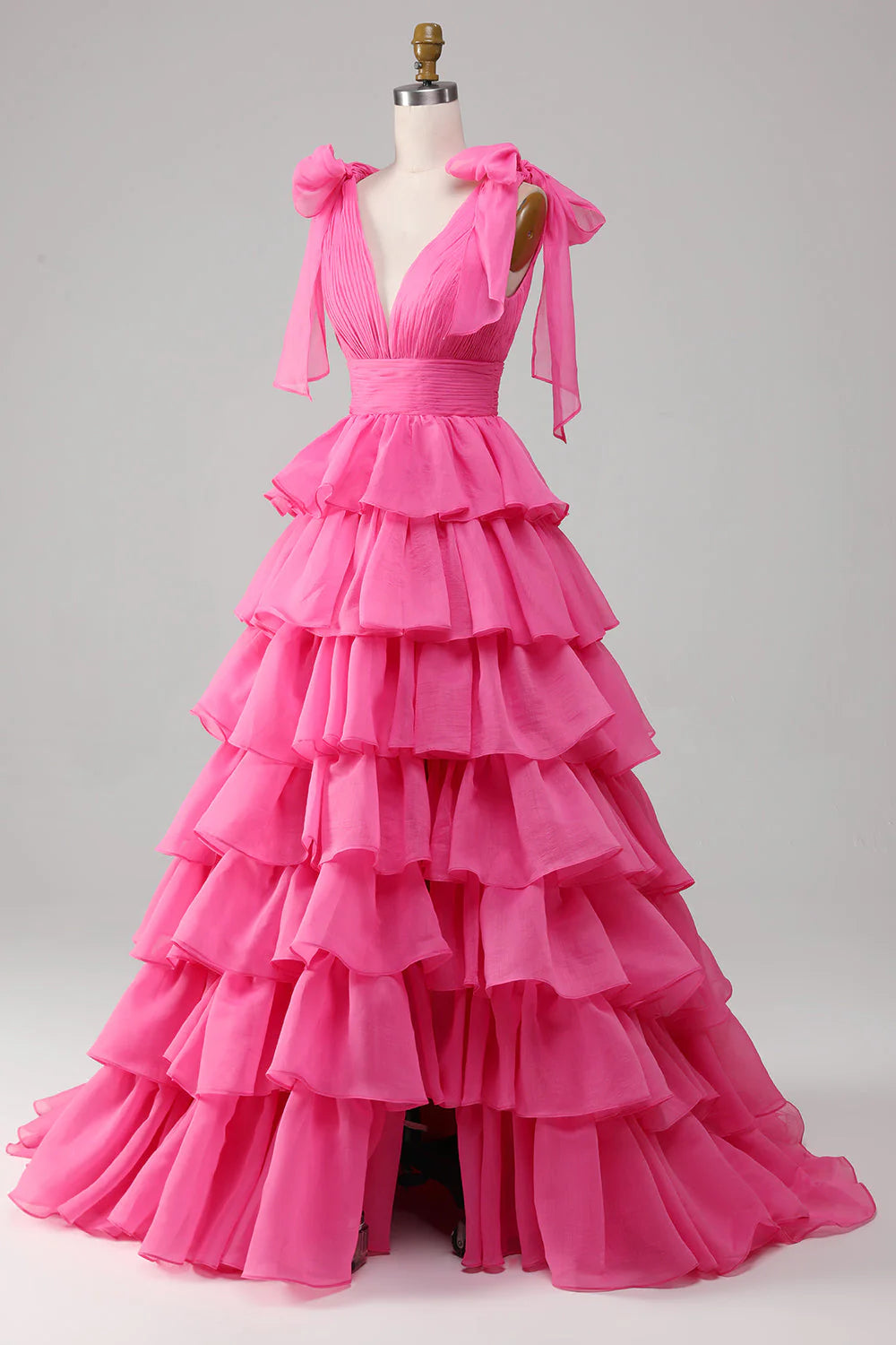 Close-up of the V-neckline and bodice of the fuchsia A-line prom dress.