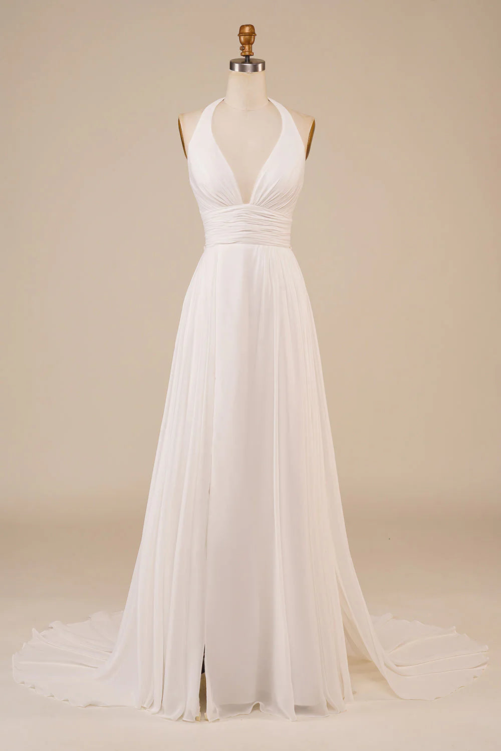 A-Line Ivory wedding gown with V-neck, high slit, and sweep train.
