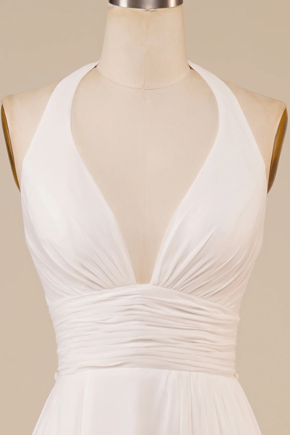 Side view of an A-Line Ivory bridal gown highlighting the high slit.