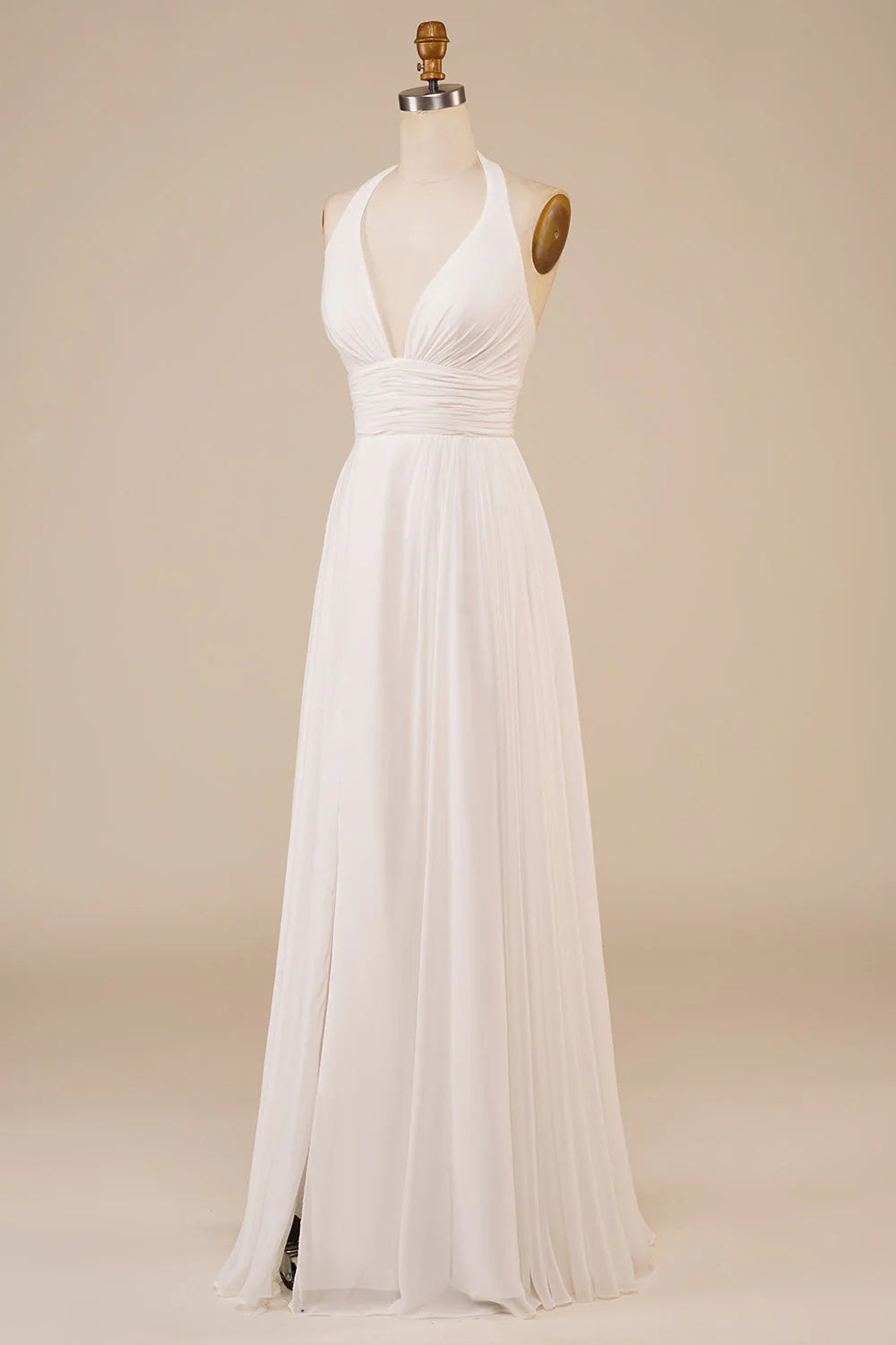 Close-up of the V-neckline and spaghetti straps on an Ivory wedding dress.