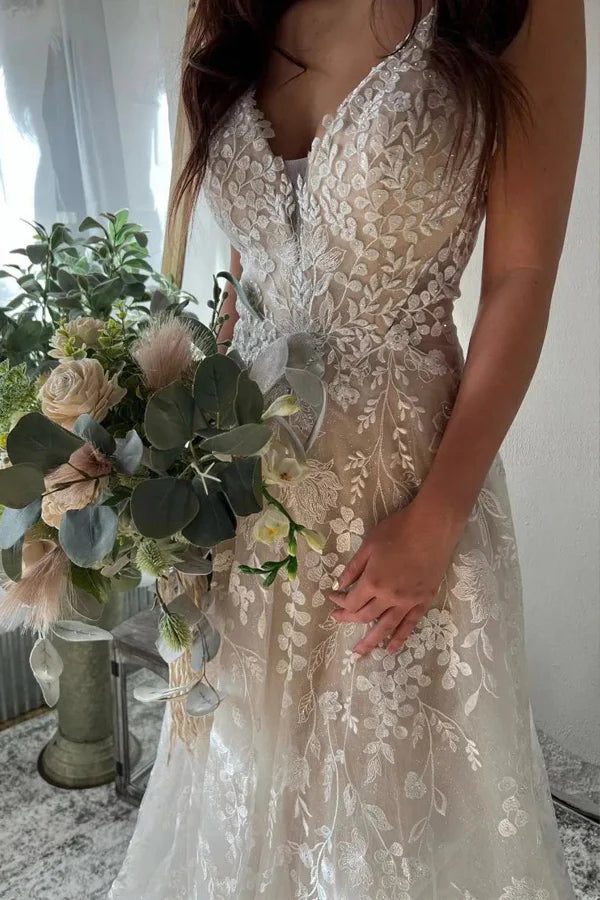 Back view of elegant A-Line wedding dress with keyhole detail.