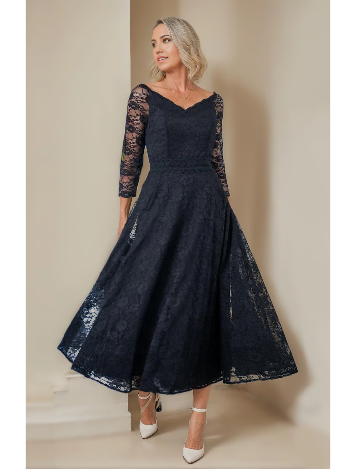 Elegant A-Line V-Neck lace tea length Mother of the Bride dress with 3/4 sleeves.